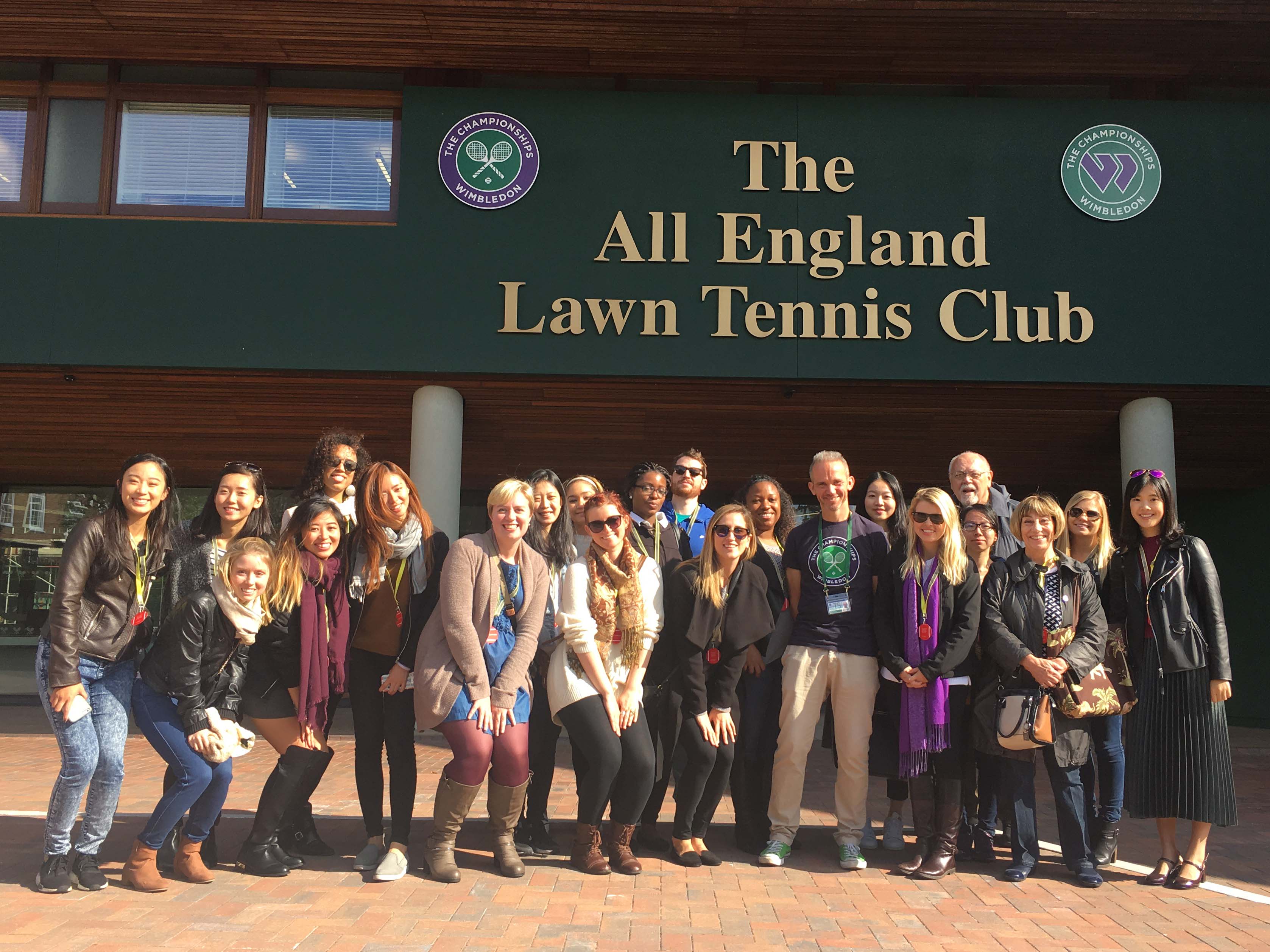 A group of IMC students and faculty outside The All England Lawn Tennis Club.